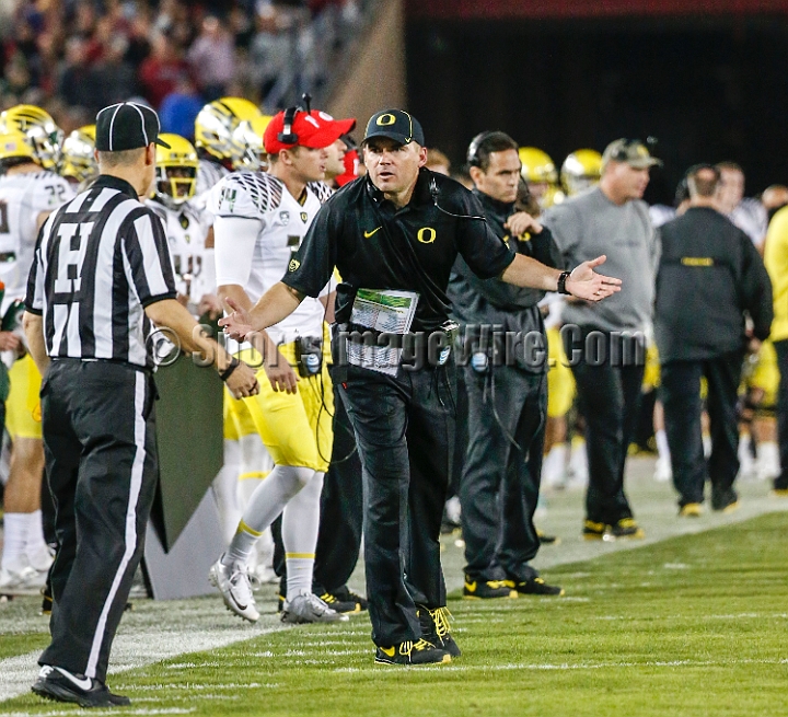 2013-Stanford-Oregon-055.JPG - Nov. 7, 2013; Stanford, CA, USA; Oregon Ducks head coach Mark Helfrich reacts to head linesman Cappy Anderson during game against the Stanford Cardinal at Stanford Stadium. Stanford defeated Oregon 26-20.